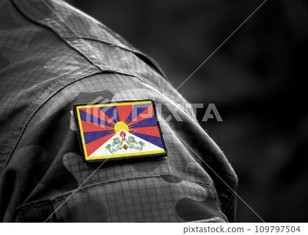 Flag of Tibet on military uniform. Army, armed forces, soldiers. Collage. 109797504