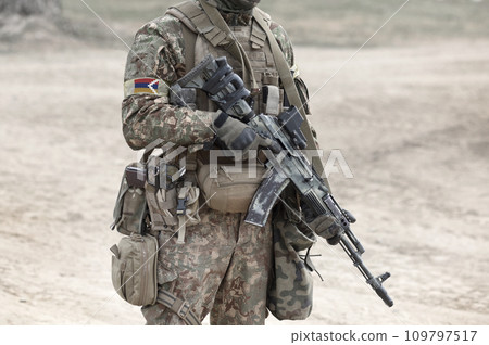 Soldier with assault rifle and flag of Artsakh and also known as Nagorno-Karabakh Republic. Collage. Soldier with assault rifle and flag of Artsakh and also known as Nagorno-Karabakh Republic. Collage. 109797517