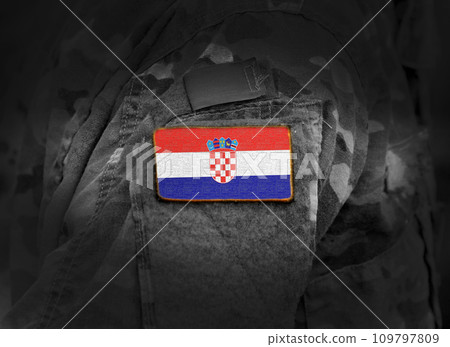 Flag of Croatia on military uniform. Army, troops, soldiers. Collage. Flag of Croatia on military uniform. Army, troops, soldiers. Collage. 109797809