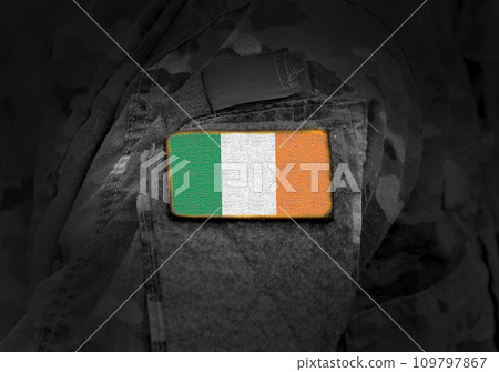 Flag of Ireland on military uniform. Army, troops, soldier, Ireland (collage). 109797867