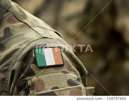 Flag of Ireland on military uniform. Army, troops, soldier, Ireland (collage). 109797868