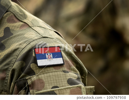 Flag of Serbian Krajina on military uniform. Army, armed forces, soldiers. Collage. 109797938