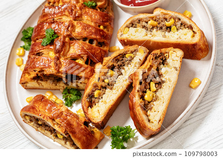 Breakfast Braid with ground beef, eggs, top view Breakfast Braid with ground beef, eggs, top view 109798003
