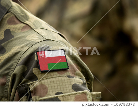 Flag of Oman on military uniform. Army, armed forces, soldiers. Collage. 109798378