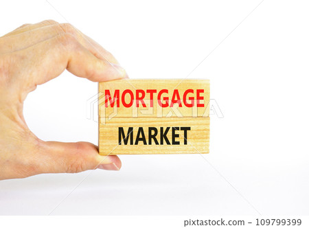 Mortgage market symbol. Concept words Mortgage market on beautiful wooden blocks. Beautiful white table white background. Businessman hand. Business mortgage market concept. Copy space. Mortgage market symbol. Concept words Mortgage market on beautiful wooden blocks. Beautiful white table white background. Businessman hand. Business mortgage market concept. Copy space. 109799399