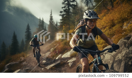 a woman is riding a mountain bike in the mountains with a person in the background 109799552