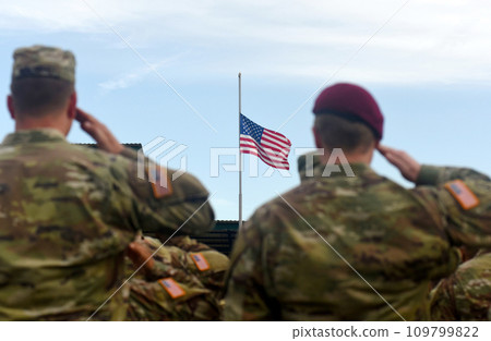 American Soldiers Saluting US Flag. US Army American Soldiers Saluting US Flag. US Army 109799822