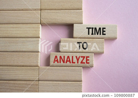 Time to Analyze symbol. Concept word Time to Analyze on wooden blocks. Beautiful pink background. Business and Time to Analyze concept. Copy space Time to Analyze symbol. Concept word Time to Analyze on wooden blocks. Beautiful pink background. Business and Time to Analyze concept. Copy space 109800887