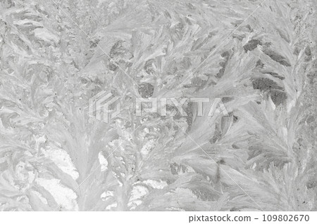 Frosty patterns on glass Frosty patterns on glass 109802670