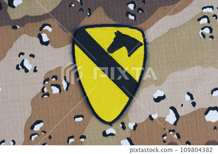 May 12, 2018. US ARMY 1st Cavalry Division patch on desert camouflage uniform May 12, 2018. US ARMY 1st Cavalry Division patch on desert camouflage uniform 109804382