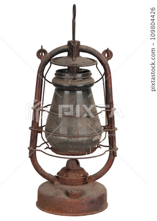 Antique rusty kerosene lantern isolated on white. Antique rusty kerosene lantern isolated on white. 109804426