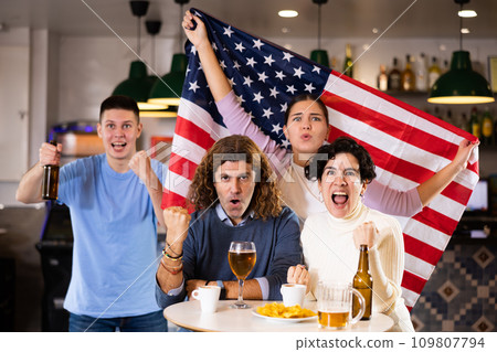 Man and woman drinking alcohol and having conversation on party in nightclub Man and woman drinking alcohol and having conversation on party in nightclub 109807794