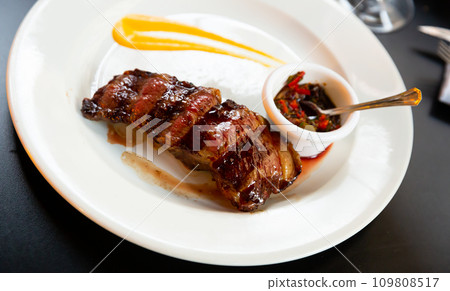 Grilled piece of Argentine beef Aberdeen Angus with salsa Grilled piece of Argentine beef Aberdeen Angus with salsa 109808517