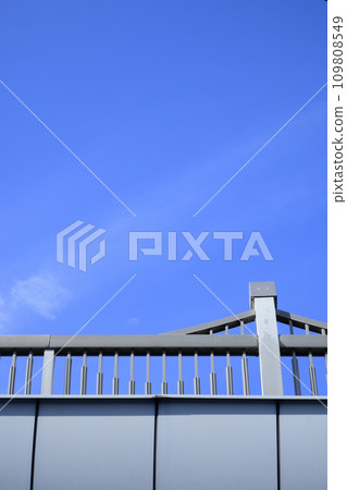 Bridge railings and blue sky Bridge railings and blue sky 109808549
