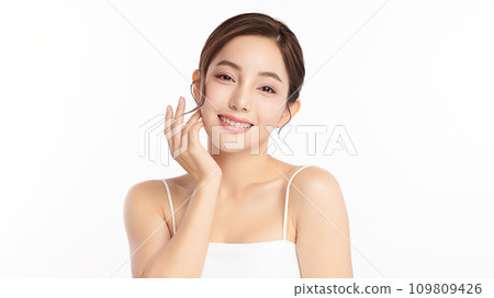 Beautiful young asian woman with clean fresh skin on white background, Face care, Facial treatment, Cosmetology, beauty and spa, Asian women portrait. Beautiful young asian woman with clean fresh skin on white background, Face care, Facial treatment, Cosmetology, beauty and spa, Asian women portrait. 109809426
