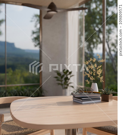 Close-up image of a copy space on a wooden desk with accessories in a modern living room. 109809571