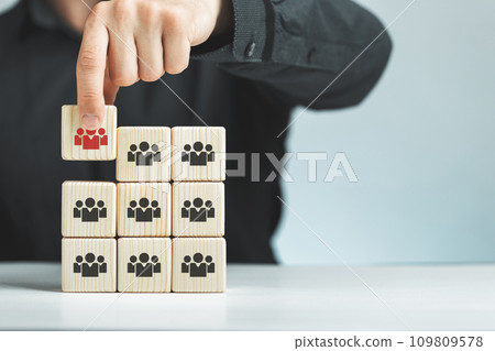Assembled wooden cubes on the theme of business leadership Assembled wooden cubes on the theme of business leadership 109809578