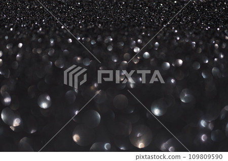 Glitter vintage lights background, light silver and black Glitter vintage lights background, light silver and black 109809590