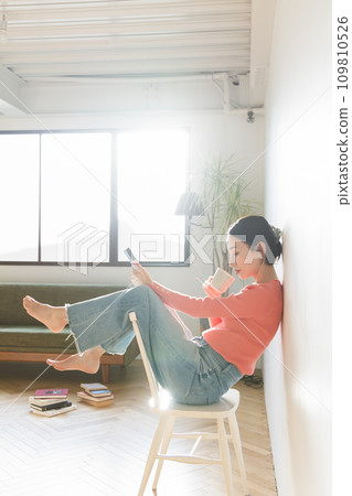 Woman thinking in the room 109810526