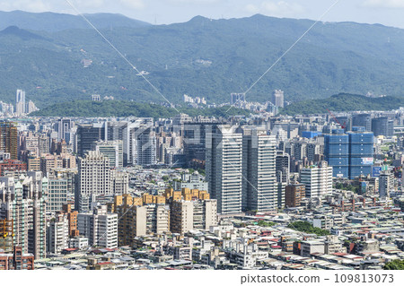View of Taipei's modern urban buildings from the top of the Xiangshan mountain in Taipei, Taiwan. View of Taipei's modern urban buildings from the top of the Xiangshan mountain in Taipei, Taiwan. 109813073