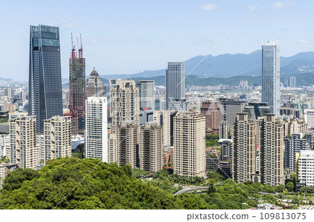 View of Taipei's modern urban buildings from the top of the Xiangshan mountain in Taipei, Taiwan. View of Taipei's modern urban buildings from the top of the Xiangshan mountain in Taipei, Taiwan. 109813075