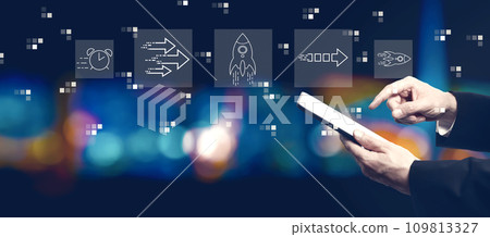 Rapid growth concept with businessman using a tablet computer 109813327