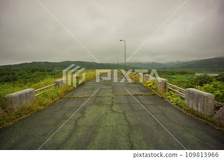 Embankment of the rockfill section of Miri River Dam 109813966
