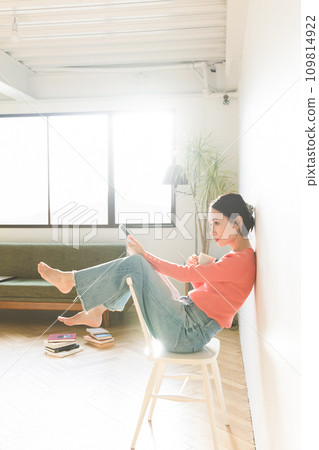 Woman thinking in the room 109814922