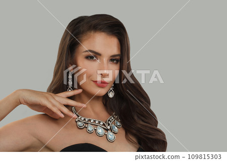 Jewelry fashion model with dark healthy hairstyle, fresh clean skin and trendy make-up Jewelry fashion model with dark healthy hairstyle, fresh clean skin and trendy make-up 109815303