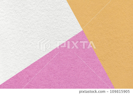 Texture of craft white, lilac and golden shade color paper background. Vintage abstract pink and yellow cardboard Texture of craft white, lilac and golden shade color paper background. Vintage abstract pink and yellow cardboard 109815905