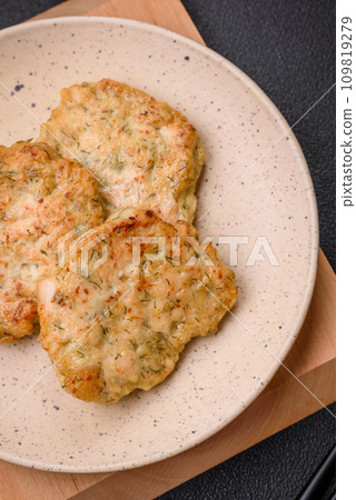 Delicious fresh fried minced fish cutlets with spices and herbs Delicious fresh fried minced fish cutlets with spices and herbs 109819279