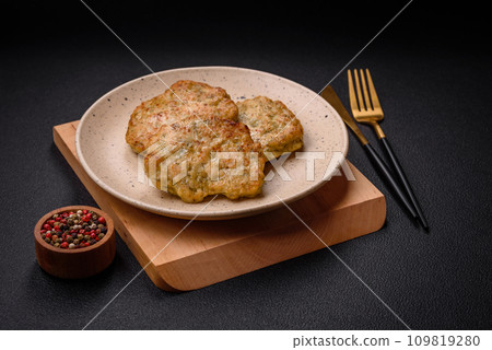 Delicious fresh fried minced fish cutlets with spices and herbs 109819280