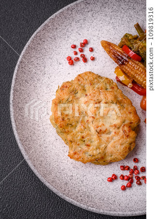 Delicious fresh fried minced fish cutlets with spices and herbs Delicious fresh fried minced fish cutlets with spices and herbs 109819316