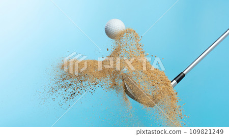 Golf ball tee explode from sand bunker. Golfer hit ball with club to sand explosion to summer sky. Golf club hit ball tee in sand wedge bunker explosion. Blue sky background isolated freeze motion Golf ball tee explode from sand bunker. Golfer hit ball with club to sand explosion to summer sky. Golf club hit ball tee in sand wedge bunker explosion. Blue sky background isolated freeze motion 109821249