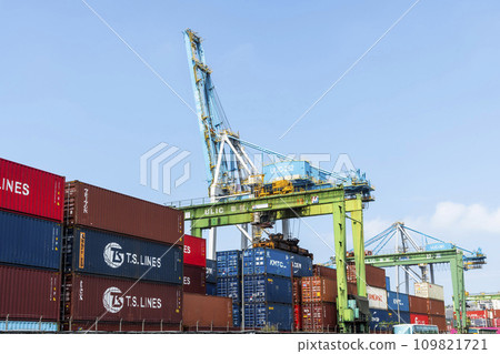 View of the container pier and crane equipment in the port of Keelung, Taiwan. View of the container pier and crane equipment in the port of Keelung, Taiwan. 109821721