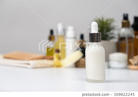 Natural herbal eco cosmetics - cream or serum in a glass jar with a pipette dispenser 109822245
