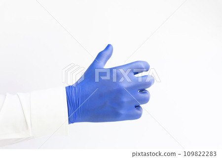 Hand in blue latex Glove grabing. Copy space, white background 109822283
