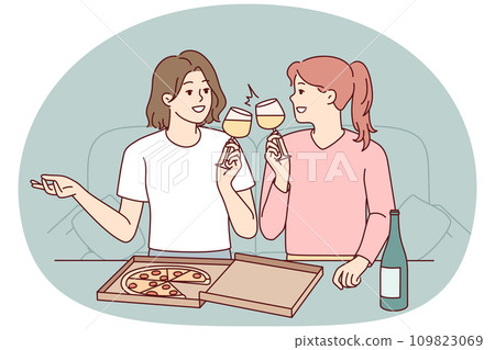 Happy girls eat pizza drink wine Happy girls eat pizza drink wine 109823069