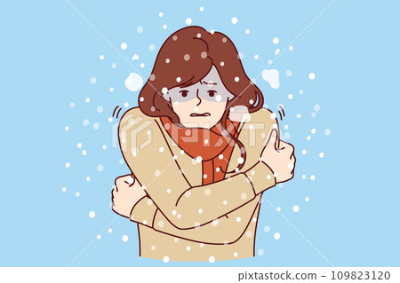 Woman freezes standing under snow in cold winter weather, dressed in sweater and needs warm jacket Woman freezes standing under snow in cold winter weather, dressed in sweater and needs warm jacket 109823120