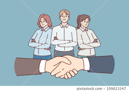 Handshake of business people during making deal and office employees standing with crossed arms 109823247