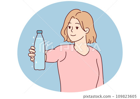 Smiling woman holding bottle of water Smiling woman holding bottle of water 109823605