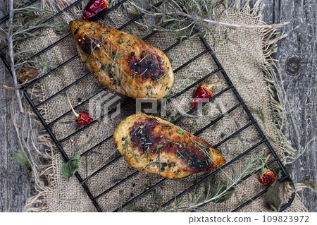 Grilled spicy chicken breast .Top view. Flat lay Grilled spicy chicken breast .Top view. Flat lay 109823972