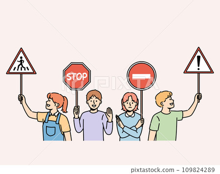 Young children hold traffic signs urging peers to follow safety rules walking streets Young children hold traffic signs urging peers to follow safety rules walking streets 109824289