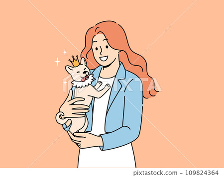 Woman holds small dog wearing crown in arms and smiles enjoying guardianship over puppy Woman holds small dog wearing crown in arms and smiles enjoying guardianship over puppy 109824364