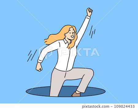 Ambitious business woman jumps out of hole in ground with hand raised up, wanting to achieve success 109824433