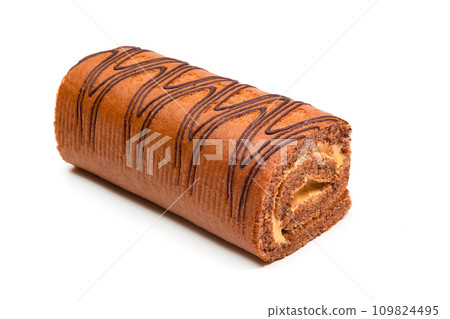 Swiss roll with chocolate cream on white background Swiss roll with chocolate cream on white background 109824495