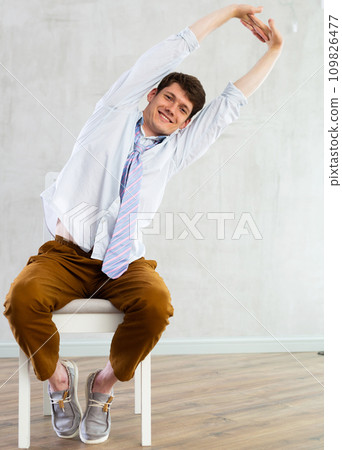 physical jerks for office workers on chair physical jerks for office workers on chair 109826477