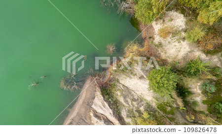 Aerial View of a River Bend and Forested Bank Aerial View of a River Bend and Forested Bank 109826478