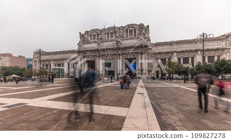 Panorama showing Milano Centrale timelapse - the main central railway station of the city of Milan in Italy. Panorama showing Milano Centrale timelapse - the main central railway station of the city of Milan in Italy. 109827278