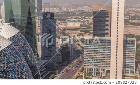 Skyline view of the high-rise buildingsin International Financial Centre in Dubai aerial timelapse, UAE. 109827328